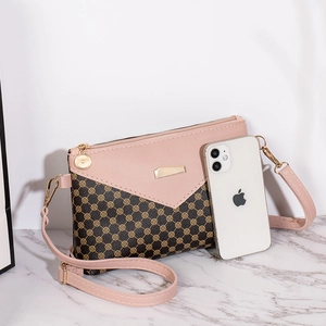 Pink and brown monogram shoulder bag with metal buckle and adjustable strap