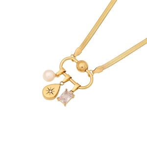 Gold stainless steel snake chain necklace with pearl, starburst, and gemstone heart charms