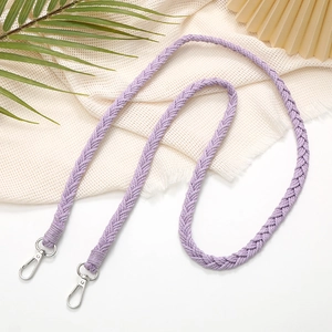 Detail of hand-woven purple phone strap with metallic silver swivel hooks for crossbody use