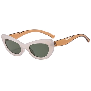 Retro cat-eye sunglasses with cream white frame and amber temples in professional studio view