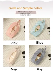 Detalle de bolsas portátiles de almacenamiento de ropa interior en cuatro colores con asa