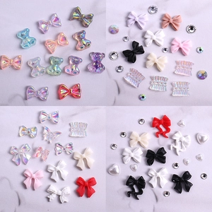 3D resin aurora crystal nail art charms featuring colorful butterflies and bears