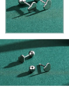 Detail of S925 sterling silver heart stud earrings with secure screw back closure