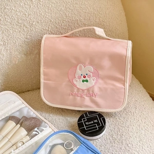 Cute pink puppy makeup bag with rabbit embroidery and Nice Day handle design