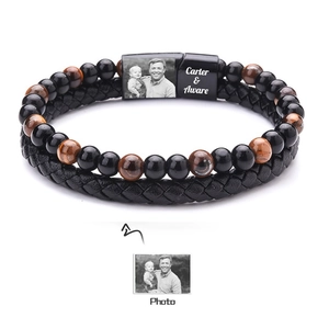 Detail showing personalized photo and name engraving on black magnetic clasp leather bracelet