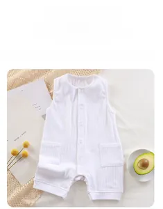Detail of ribbed knit cotton baby romper with snap buttons and small pockets