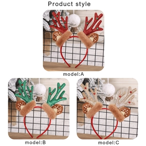 Detailed view of sequined reindeer antler headbands in red, green, and champagne gold colors