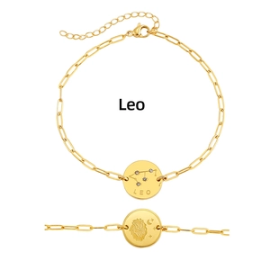 Detailed view of Leo zodiac constellation and lion head engraved gold bracelet charms.