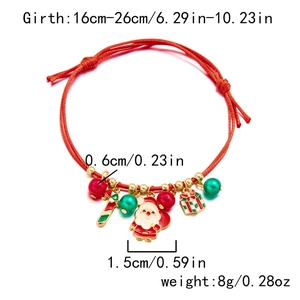 Detail showing adjustable red woven Christmas bracelet with enamel Santa and candy cane charms