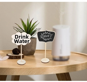 Mini wooden chalkboard signs on round bases for wedding table decor and plant labels