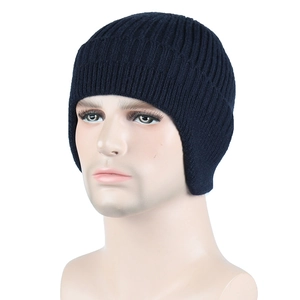 Close-up of deep blue ribbed knit texture and thick warm lining on men winter beanie