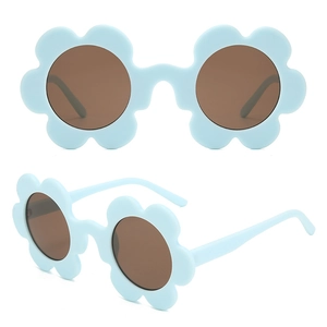 Close-up of light blue flower-shaped sunglasses with brown lenses from multiple angles