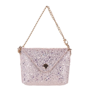 Macro detail of pink glitter mini bag with gold chain strap and snap button closure