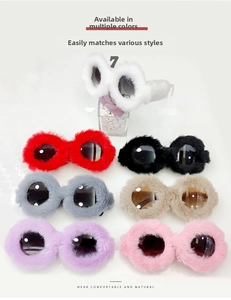 Flat lay of round plush-wrapped sunglasses in seven colors on a white glossy surface