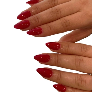 Glossy red almond shape press-on nails set for a classic manicure look