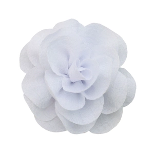 Detailed view of a white bubble crepe fabric flower with delicate layered petals