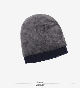 Detail view of the thick plush fleece lining in this warm winter knit hat for men
