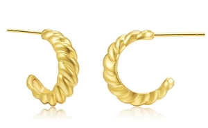 Detailed view of golden twisted croissant hoop earrings with a polished metallic finish