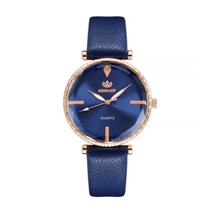 Detailed view of women's quartz watch with navy leather strap and rose gold bezel