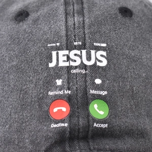 Dark grey washed cotton baseball cap with creative Jesus Calling smartphone screen print