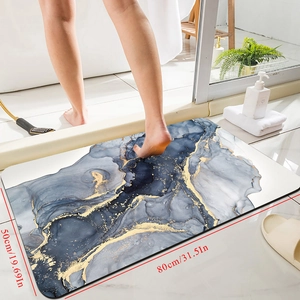 Detail of marble pattern bath mat showing 50x80cm size on white bathroom floor