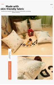 Close-up of soft plush pillow cover with silver snowflake print and Merry Christmas text