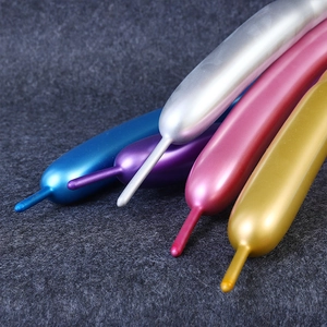 Assorted metallic long magic balloons in gold, silver, pink, blue, and purple shades