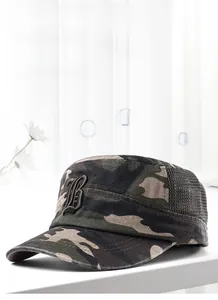 Detail of breathable mesh panel and camo cotton fabric on a men's military flat top hat
