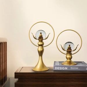 Luxe lotus crystal ball decor with golden metal stand and round frame for modern home display