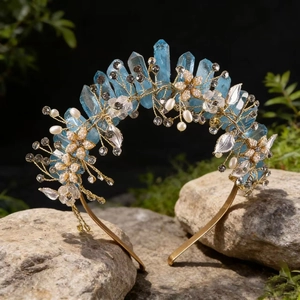 Detailed view of handmade crown with blue quartz crystals and golden wire floral design