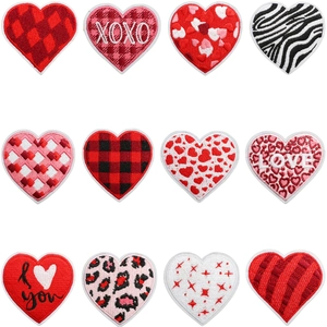 Detailed grid view of 12 assorted red and patterned heart embroidery patches for clothing