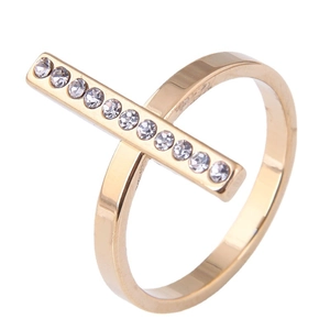 Minimalist gold stainless steel ring featuring a bar set with clear sparkling crystals