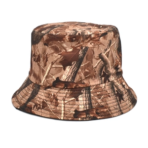 Detail of forest camouflage bucket hat showing durable stitching and high-density fabric