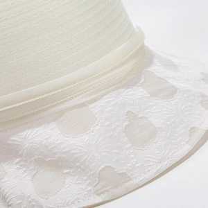 Elegant white organza sun hat with lace embroidery and floral details for weddings