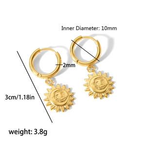 Detail view of 18K gold plated stainless steel sun charm hoop earrings with 10mm inner diameter