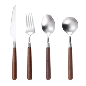 Retro 304 stainless steel cutlery set with walnut wood handles in four-piece minimalist design