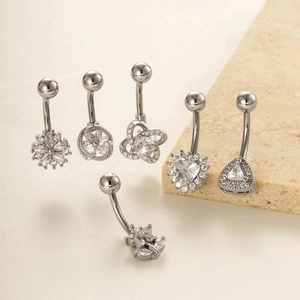 Geometric stainless steel belly rings with sparkling zircon crystals in six diverse styles
