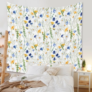 Detail of bohemian tapestry featuring watercolor wildflowers in a cozy bedroom setting