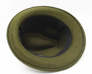 Detailed interior view of a wool fedora hat showing the sweatband and care label