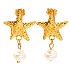 Golden starfish stud earrings with white baroque pearl pendants on a clean background
