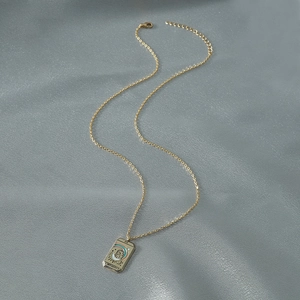 Vintage gold tarot necklace with L'IMPERATRICE Empress pendant on grey silk