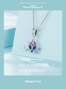 Macro detail of S925 sterling silver lotus pendant with purple and blue gradient gemstone