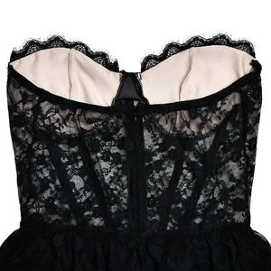 Detail of black lace tube dress with nude lining and invisible central zipper