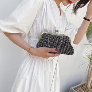 Elegant black rhinestone evening clutch bag with silver metal chain and clasp for women