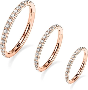 Three rose gold hinged segment rings with clear crystals for nose or ear piercings