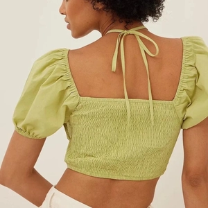 Light green puff sleeve cropped top with back ribbon tie and ruched texture for women