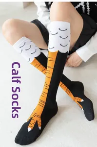 Funny chicken feet knee high socks with bright yellow claw print on black fabric