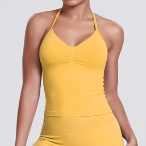 Detailed texture of seamless yellow ribbed fabric on this halter yoga sports top