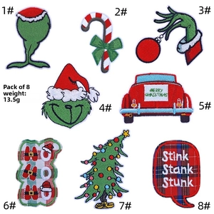 Macro detail of 8-piece Grinch-themed Christmas embroidery iron-on patches set