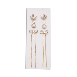 Six-piece gold earring set with rhinestones, faux pearls, and elegant bow tassels